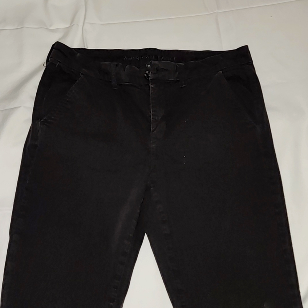 Black American eagle size 12, 14, 16 reg as well as 12 long and 14 long pants